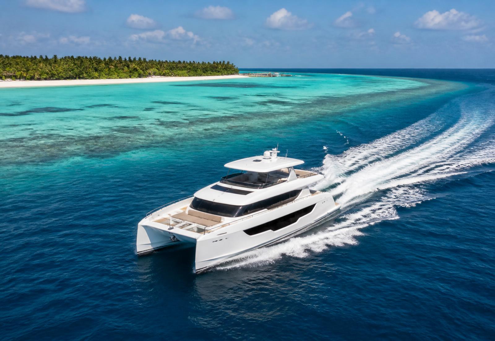 Luxury catamaran crossing a turquoise Maldivian lagoon